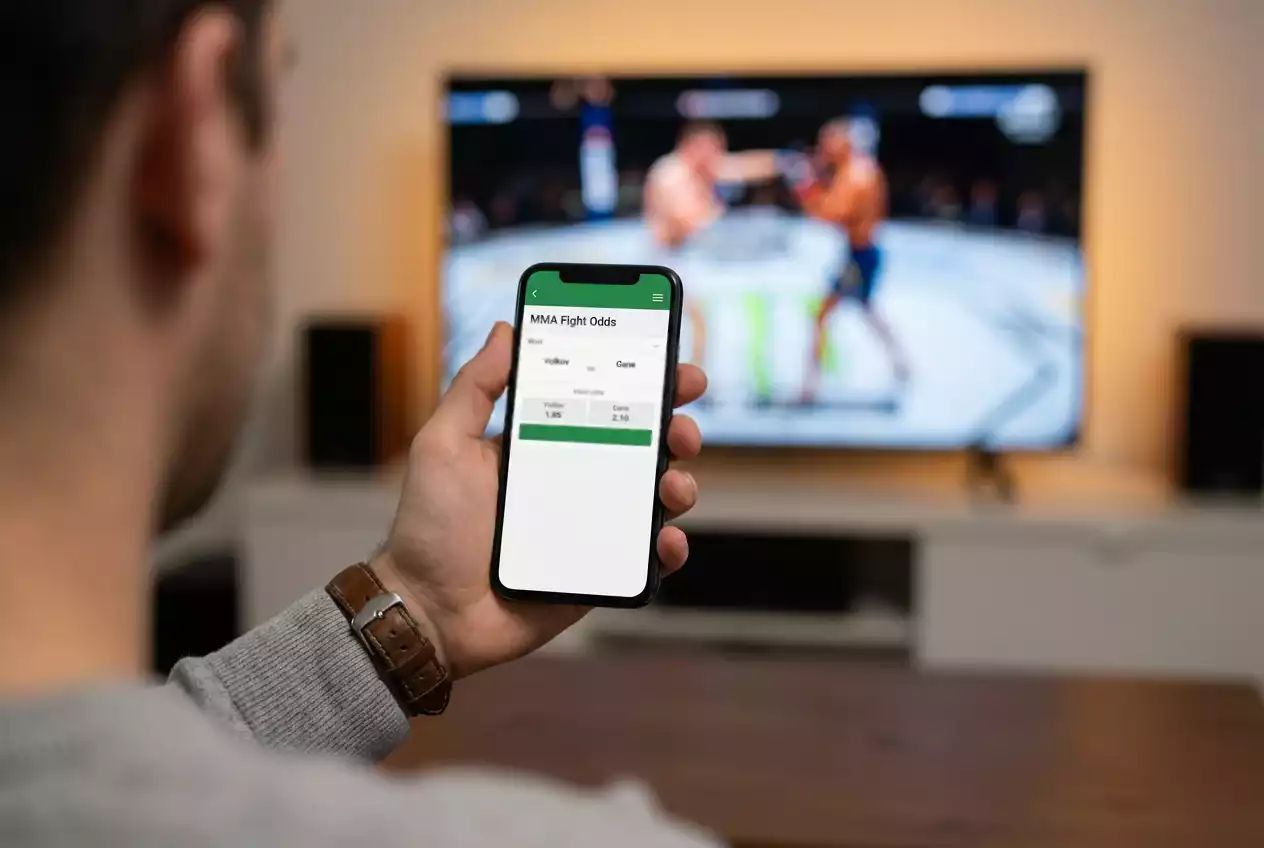 Pantalla de operador mostrando mercados de apuestas en una pelea de UFC con cuotas moneyline